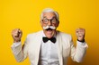 Wild senior silver-haired mustached gentleman in white top, necktie standing alone on yellow backdrop in photo studio, Life style idea, Model copy area, Yelling, extending lifted arms.