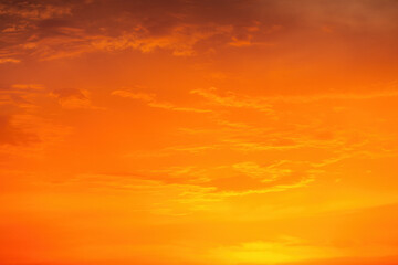 Wall Mural - cloudscape and dramatic orange sky, sunrise shot