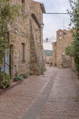 Wall Mural - tile paved street and old tuff houses at medieval village, Sovana, Italy