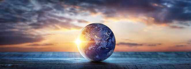 Wall Mural - planet earth on the background of blurred lights of the city. concept on business, politics, ecology