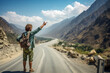 One hitchhiker standing on a road surrounded by mountains. White traveler pointing at something with his finger. AI-generated