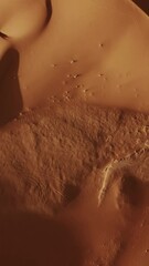 Wall Mural - aerial top view on sand dunes in sahara desert, africa. vertical video