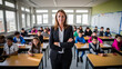 © Andrea Raffin - Portrait of a teacher in a school classroom, students on the background.