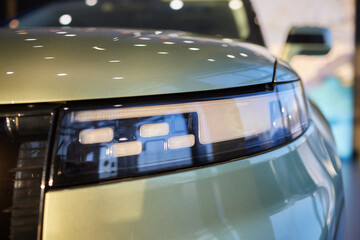 Sticker - headlight of modern prestigious car close up