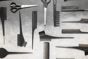 Wall Mural - Set of hairdresser's tools on grey background