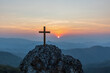 © AungMyo - Silhouettes Crucifixion cross on top mountain with sunset background.religion and christianity concept