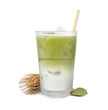 Glass of tasty iced matcha latte, bamboo whisk, spoon and powder isolated on white