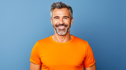 portrait of a smiling middle-aged man with gray hair