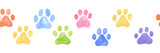 Dog paw seamless border. Multicolored puppy or cat paw track. Abstract endless animal background