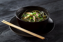 Korean Seaweed Soup With Meat In A Black Bowl. Birthday Soup. Korean Cuisine. Healthy Diet. Pregnancy. Tradition. Custom.