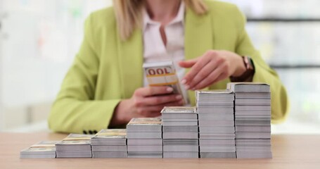 Wall Mural - Stack of dollars in ascending stairs in office