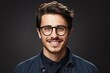 background white isolated glasses haircut trendy man handsome Smiling portrait male model goggles eyeglass photogenic guy shirt denim face casual attire people fashion attractive young studio jean
