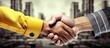 Construction workers sealing a successful business deal through a handshake.