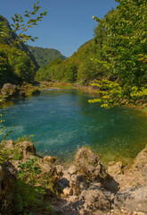 Wall Mural - The River Una at the bottom of Strbacki Buk, a terraced waterfall on the border between the Federation of Bosnia and Herzegovina and Croatia. Early September