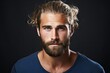 camera expression serious looking tshirt blue beard hairstyle stylish man young beautiful Close adult male manly emotion mature unshaved caucasian alone attractive bearded copy space studio