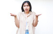 © M Alfan Setyawan - confused asian woman wear casual clothes with raised palms questioning gesture isolated on white background
