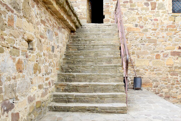 Wall Mural - old stone staircase leading to the main entrance of the castle