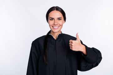 Canvas Print - Photo of happy good mood positive smiling woman judge showing thumb-up like isolated on white color background