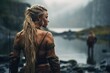 A Viking stands poised and resolute on the battlefield, her intricate braids and battle-worn armor embodying the fierce spirit of the legendary female warriors of Norse mythology