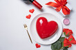 heart shaped glazed valentine cake, gift and champagne on white background