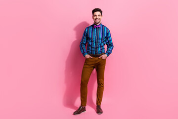 Sticker - Full body photo of positive confident elegant person put hands pockets posing isolated on pink color background