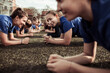 © Davor - Youth female football team having practice on soccer field