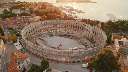 Wall Mural - Aerial view of the historic Roman Amphitheatre of Pula at sunset, Croatia