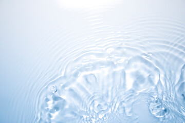 Wall Mural - the clear blue surface of the water gradients from light to dark.
