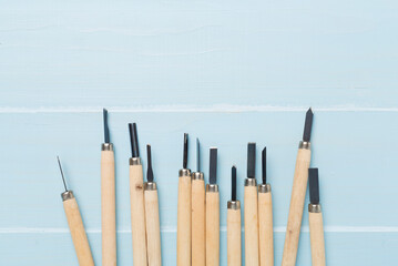 Carpenter tools on wooden background,top view