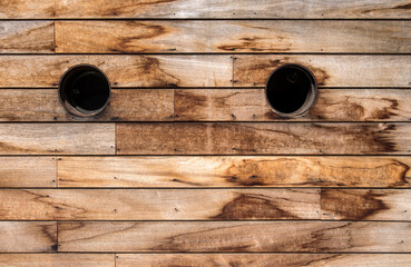 Wall Mural - Brown wooden wall texture with portholes