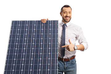 Wall Mural - Businessman behind a solar panel pointing with finger