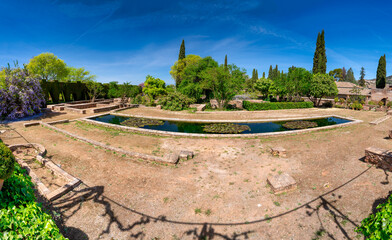 Wall Mural - Alhambra gardens on a beautiful sunny day, Granada - Spain