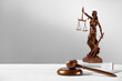 © Olajide - A still life scale of justice with a judgement gavel