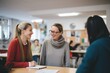 © Martin - Classroom Connection: Smiling Teachers Engaged in Positive Discussion