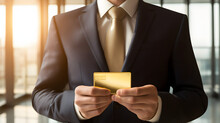 A Person Wearing A Suit And Holding A Gold Bar In A Corporate Office.
