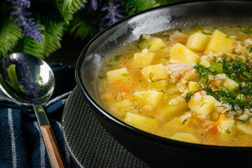 Canvas Print - Barley soup with vegetables and chicken.