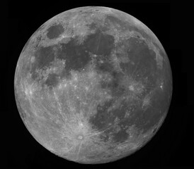 Wall Mural - photograph of the full moon, taken with a camera on a day of a large full moon. craters, relief and 