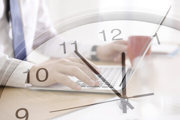 Wall Mural - Time concept. Double exposure of man working on laptop and clock
