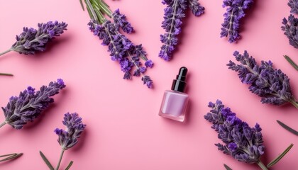 Canvas Print - A bottle of nail polish sits on a pink table with purple flowers