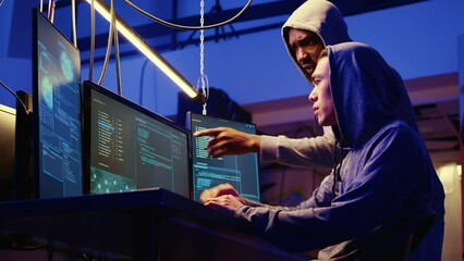 Hackers brainstorming ways of getting past anti tamper measures implemented by companies trying to protect their products. Crackers trying to pirate software and video game releases