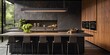 © Lasvu - The contemporary kitchen features natural veneer facades and anthracite painting.
