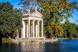 Temple of Aesculapius ancient building view at the lake of Villa Borghese
