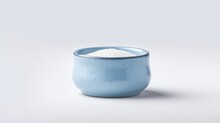 A Blue Salt Cellar, Showcasing Its Smooth Surface And Elegant Simplicity, Perfectly Isolated On A Spotless White Background.