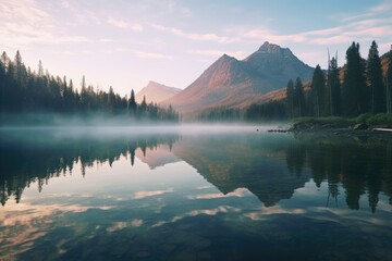 Poster - A serene landscape featuring a mountain reflected in a body of water. Ideal for nature-themed designs and travel-related projects