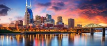 Nashville Skyline Illuminated At Dusk With Vibrant City Lights And Iconic Landmarks In Tennessee, Usa