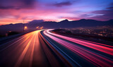 Fototapeta Perspektywa 3d - Photo of a highway at night. Neon night highway track with colorful lights and trails