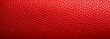 Detailed texture of red leather material close-up