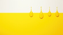 Four Yellow Droplets On A White Background
