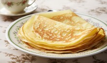 Close-up Photo Of French Flat Crepe Pancakes On A Plate On The Table For Breakfast Time, Plain Or To Eat With Sugar, Jam, Chocolate Sauce, Honey Or Maple Syrup, Healthy Homemade Pastry, A Yummy Meal