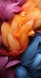 Soft feather arrangements in rich, saturated tones